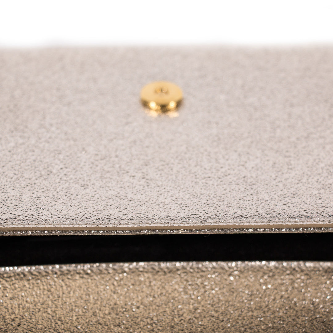 Saint Laurent Monogram Metallic Clutch Bags Yves Saint Laurent - Shop authentic new pre-owned designer brands online at Re-Vogue