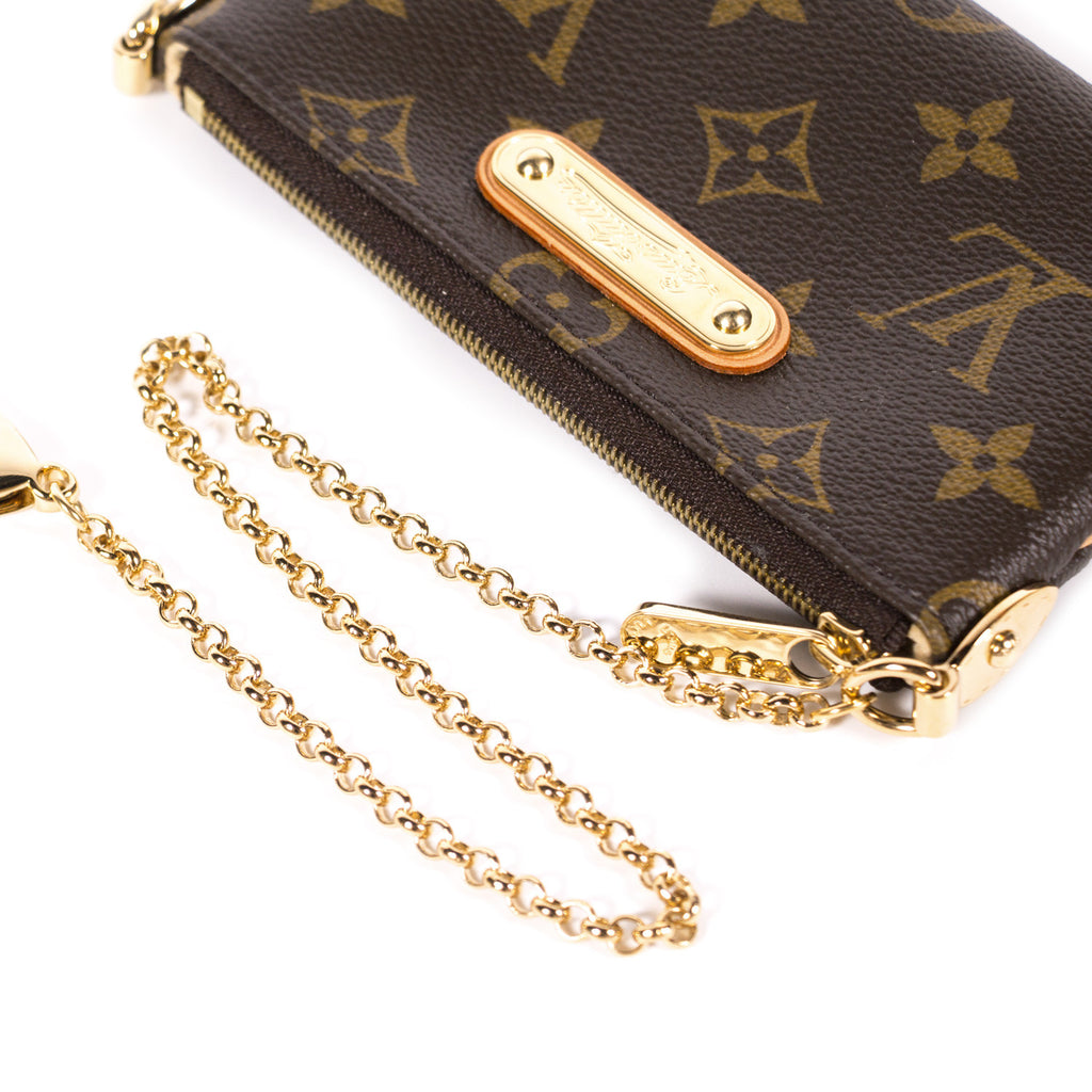 Louis Vuitton Milla Clutch Bag Bags Louis Vuitton - Shop authentic new pre-owned designer brands online at Re-Vogue